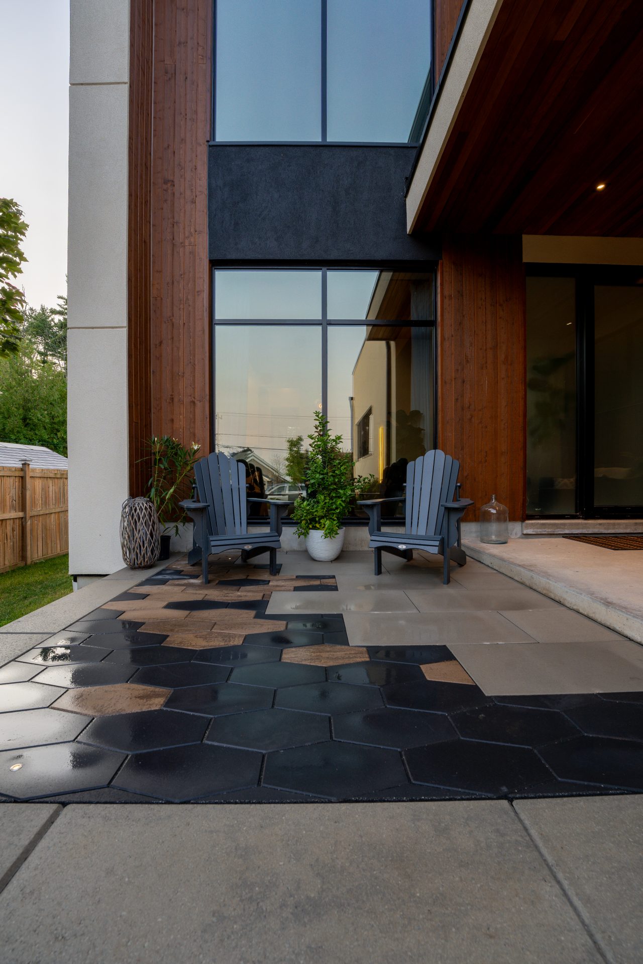 Modern patio with chairs and hexagonal tiles