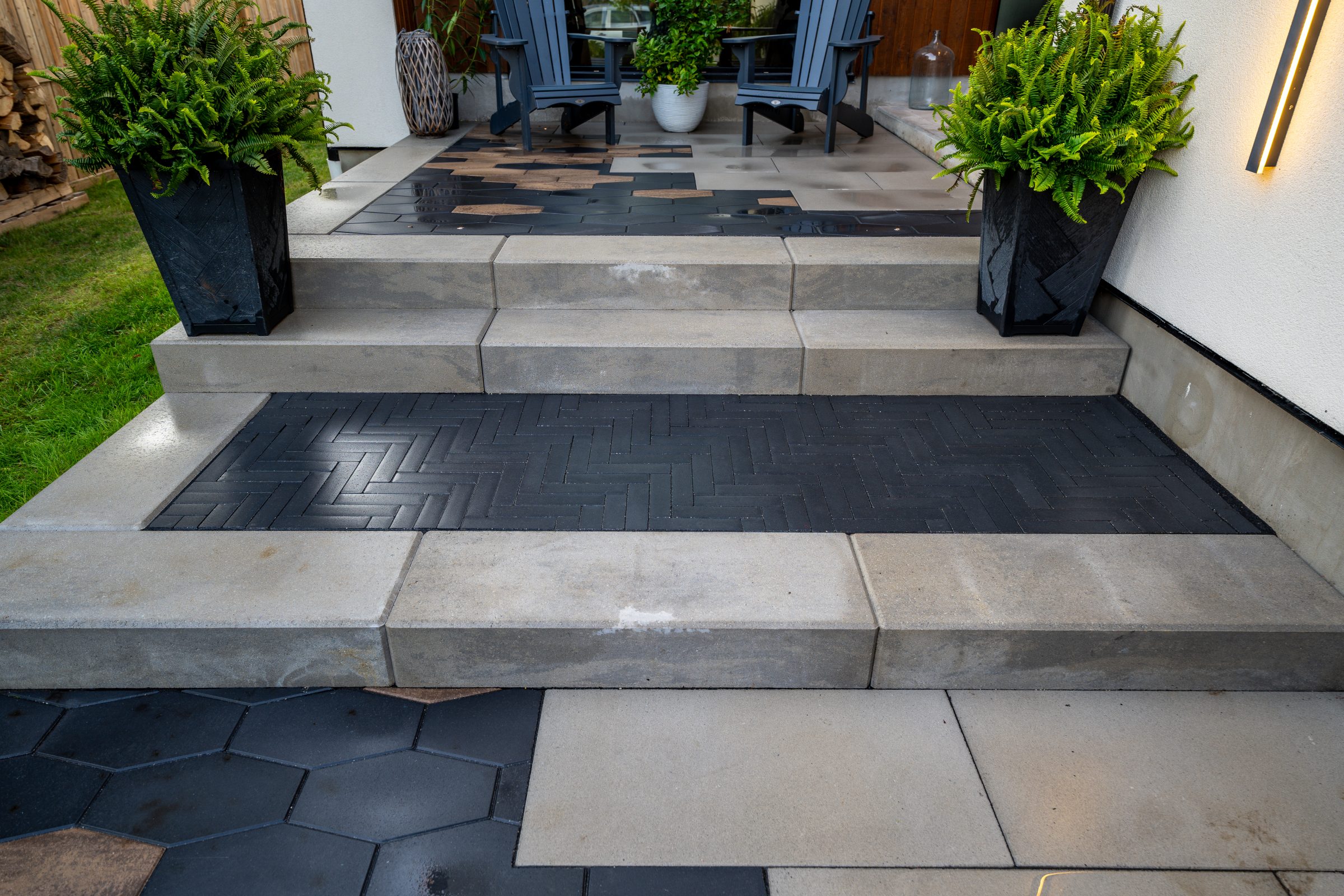 Modern patio with steps and green plants