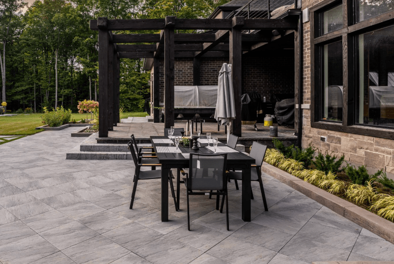 Modern patio with dining table and chairs